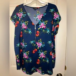 Express Floral Blouse in a size XL.